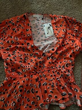 Corey Lynn Calter NEW Satin Peplum Top Size Medium Orange Animal Print Long Slv
